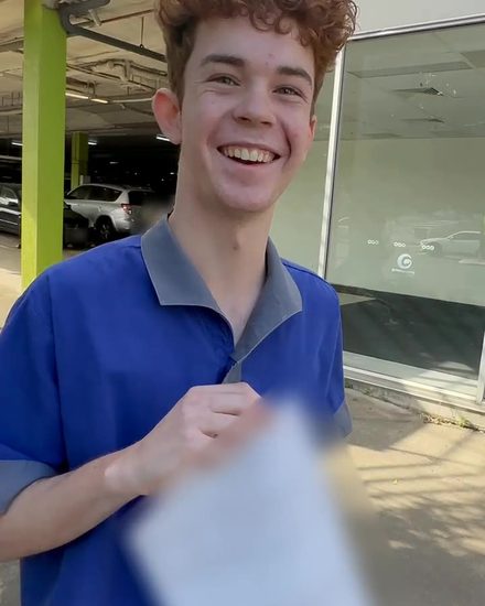 Tom smiling after passing his driving test